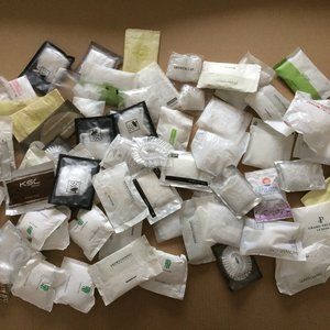 - 67 shower caps individual wrapped in packets & 5 packs with caps and scrunchy